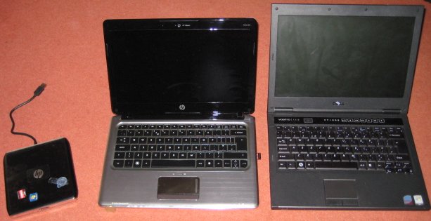 New HP dm3-1020ea (centre) versus Dell Vostro (right)
